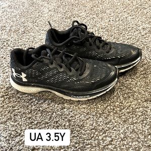 Youth UA tennis shoes